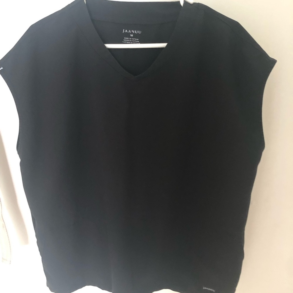 Like New condition black Jaanuu scrub top